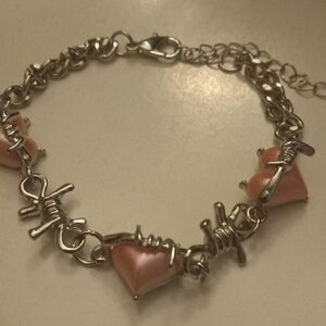 New,delicate tiny silver chain bracelet with 3 plastic pink hearts,adjustable.